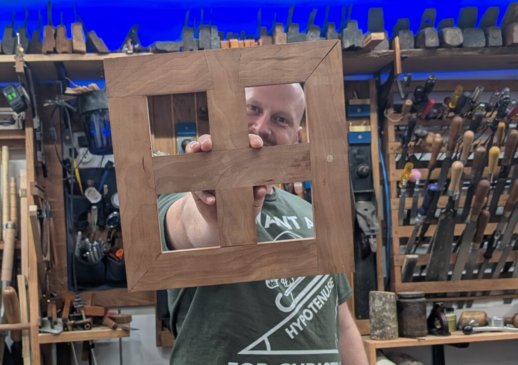 picture of a wooden joinery window featuring 9 different joints and 6 different boards made by James Wright wood by wright